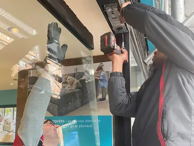 Technicians install commercial glass doors in Memphis, TN