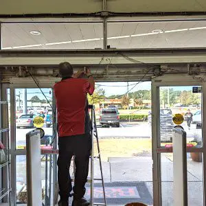 AAADM Certified Technician Conducts Maintenance on Automatic Door Operators