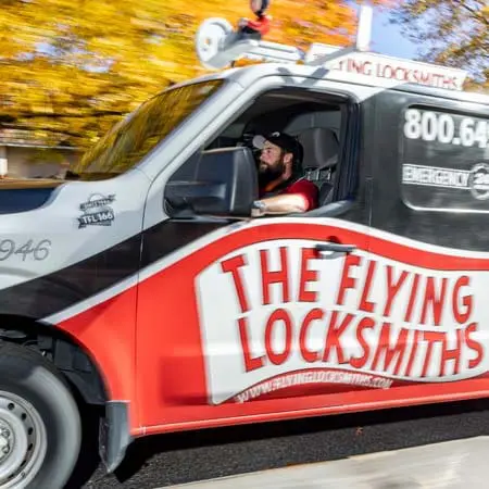 TFL service van driving to conduct automatic door operator service near Spartanburg, SC