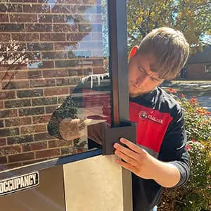 Kansas City Locksmith Installs Key Cylinder on Storefront Door