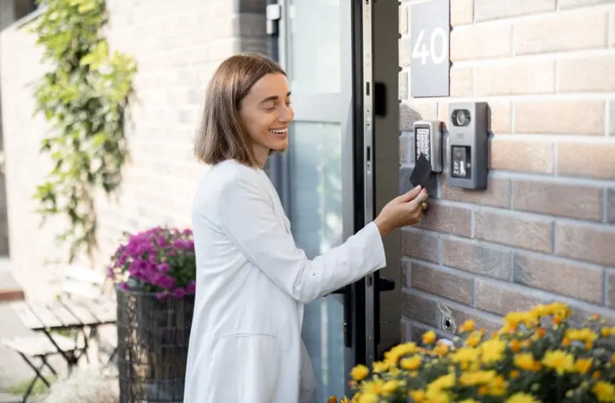 Tenant Uses a Keycard to Open Apartment Door at a Multifamily Complex