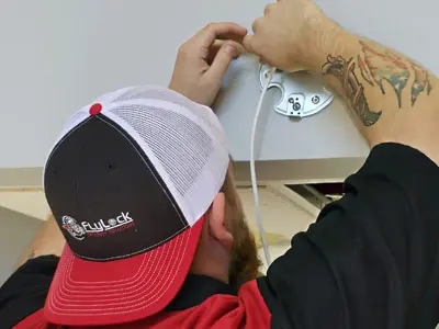 technician installs security camera in Greensboro, NC