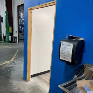 Opening being prepared for a hollow metal frame installation in Simpsonville, SC