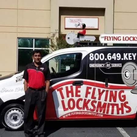Photo of TFL owner Ravi in front of a service van at the office in Peachtree City, GA 