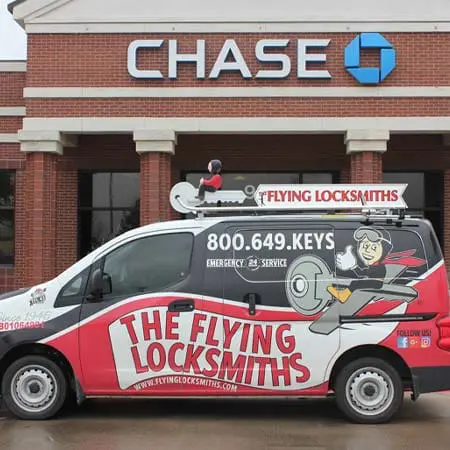 The Flying Locksmiths van at Chase Bank for a commercial door repair service near Worcester, MA
