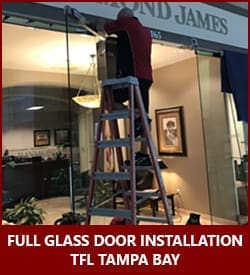 TFL Tampa Bay door security specialists installing new full glass doors