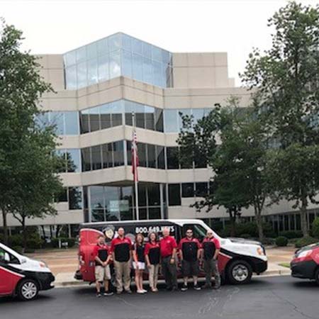 The Flying Locksmiths team photo in front of office building in Memphis, TN
