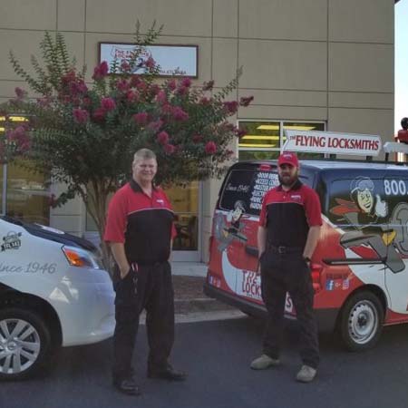The Flying Locksmiths access control technicians after a security system installation near Fayetteville, GA