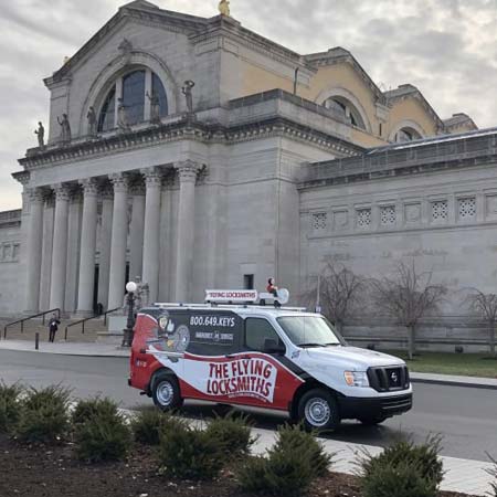 The Flying locksmiths van at a government building to do a commercial door repair near St. Louis, MO