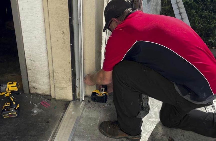 Door security specialist performs commercial door repair